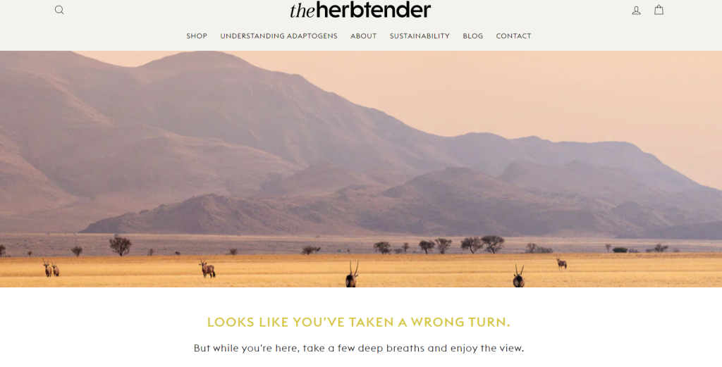 A screenshot of The Herbtender's 404 page. A beautiful landscape fades in. Below text reads "Looks like you're taken a wrong turn. But while you're here, take a few deep breaths and enjoy the view" 